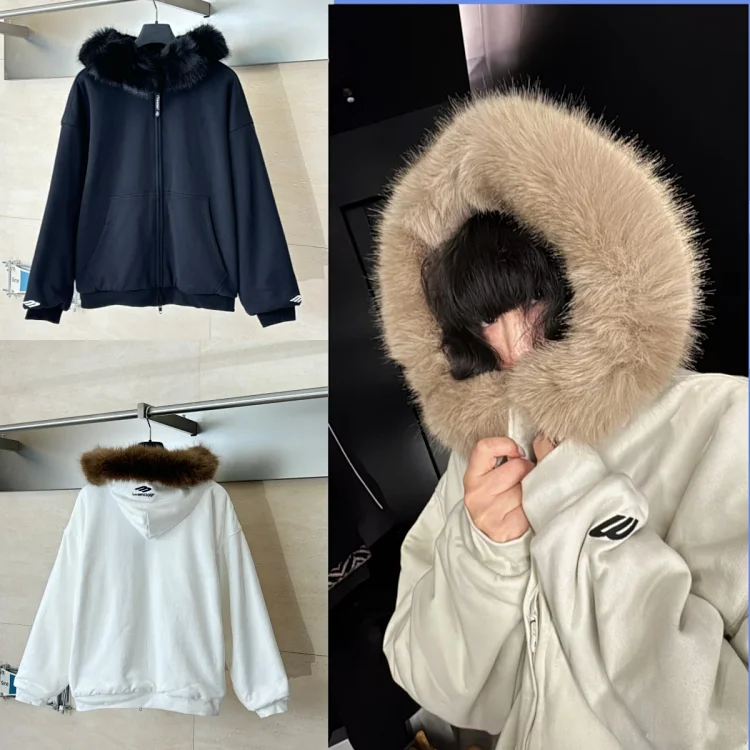 Balenciaga Zippered long-sleeved hooded jacket with a fur collar.